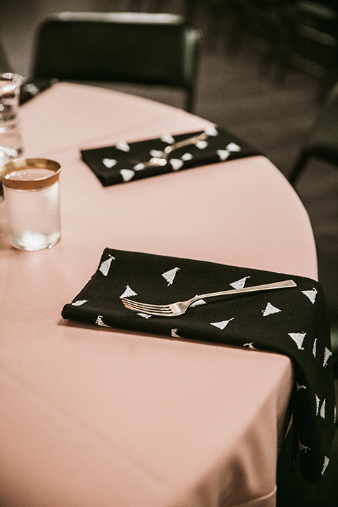 Moniker-Warehouse-Wedding-table-linens-in-light-pink-with-black-decor