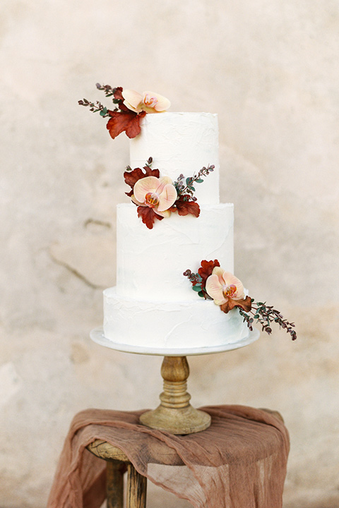 san-gabriel-mission-wedding-shoot-cake-with-white-tiers-and-floral-accents