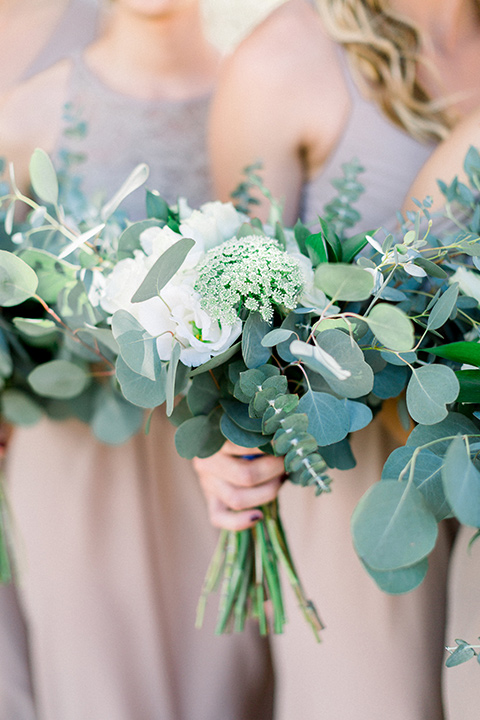 Circle-Oak-ranch-wedding-bridesmaids-florals-in-sage-greens-and-white