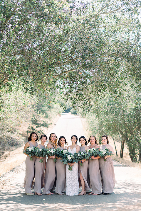 Circle-Oak-ranch-wedding-bridesmaids-in-taupe-long-dresses