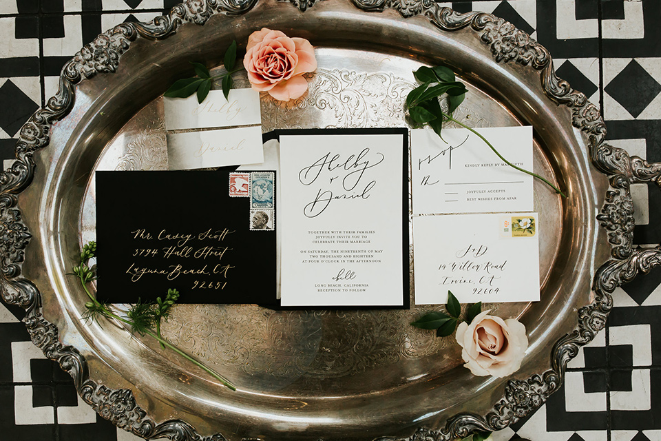 white invitations and black envelopes