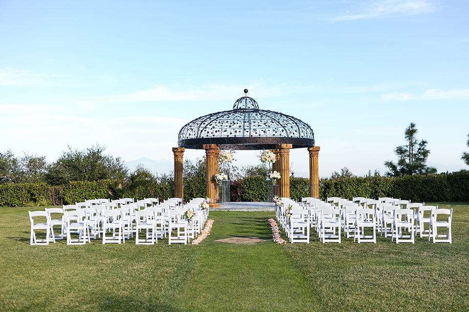 Vellano-Country-Club-ceremony-space-with-big-gazebo-and-white-chairs