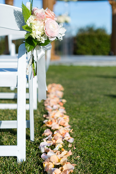 Vellano-Country-Club-chairs-at-ceremony-lined-with-rose-petals