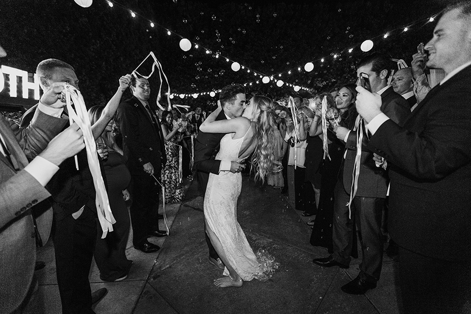 black and white photos of the bride and groom kissing at their send off