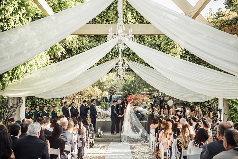 bride and groom at their ceremony outdoors