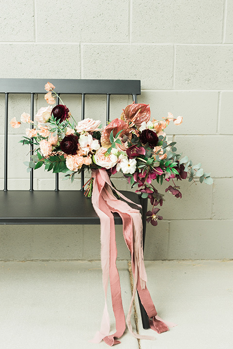 the-lautner-compound-wedding-flowers-on-bench