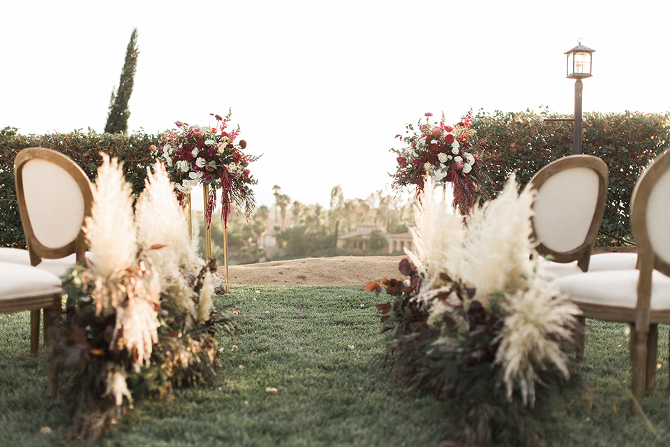 Temecula-outdoor-wedding-at-callaway-winery-ceremony-décor-with-feather-grass-detailing