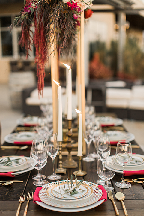 Temecula-outdoor-wedding-at-callaway-winery-table-set-up-with-flowers-and-place-settings