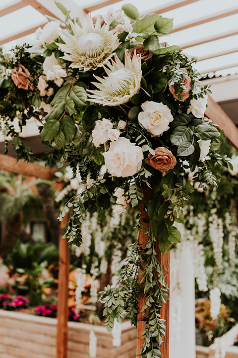 la-jola-shores-hotel-wedding-ceremony-arch-close-up-with-casading-florals-coming-down