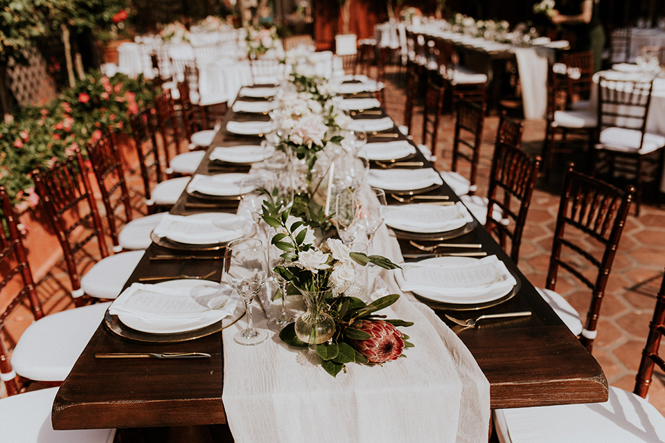 la-jola-shores-hotel-wedding-table-set-up-with-wooden-tables-and-whtie-linens