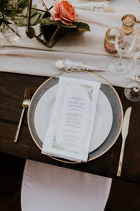 la-jola-shores-hotel-wedding-table-settings-with-clear-charger-plates-and-gold-flateware