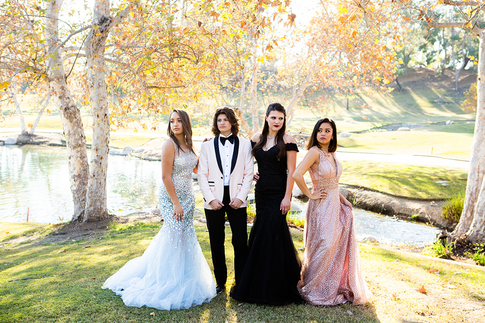 female-tuxedo-for-prom-our-amazing-high-school-senior-olivia-wearing-a-blush-colored-shawl-lapel-tuxedo