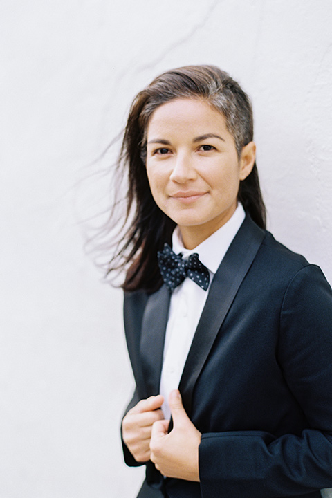 female-model-in-a-shawl-lapel-black-tuxedo-and-black-patterned-bow-tie