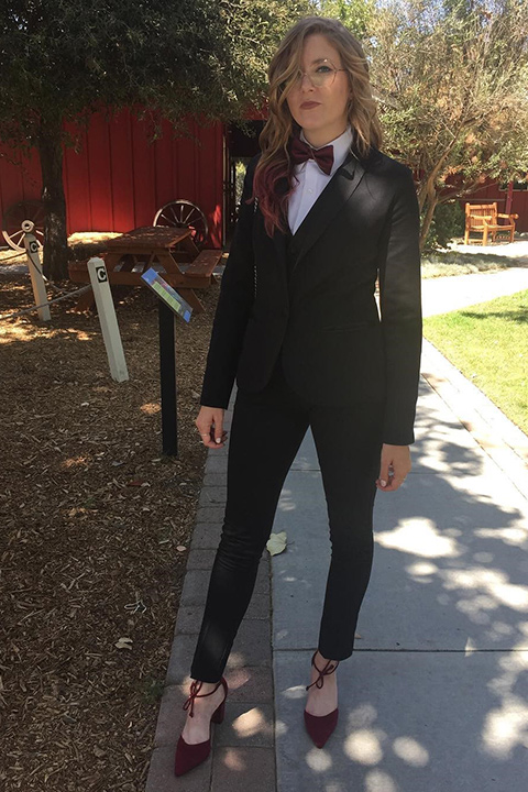 girl-wearing-tuxedo-as-a-groomsman-in-ceremony-wearing-a-black-shawl-lapel-tuxedo