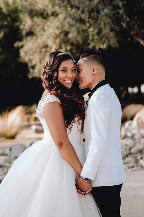 bride-in-a-white-with-black-shawl-lapel-tuxedo