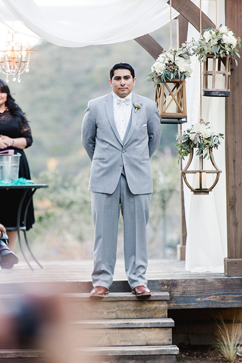 hidden-acres-wedding-groom-waiting-for-bride-groom-in-light-grey-suit