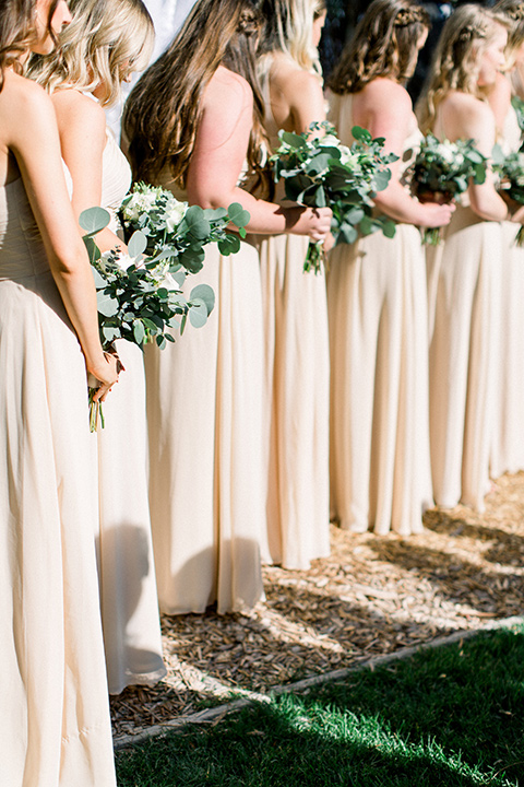  bridesmaids in neutral long gowns