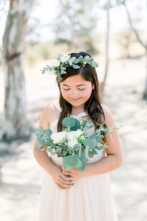  flower girl in a floral crown 