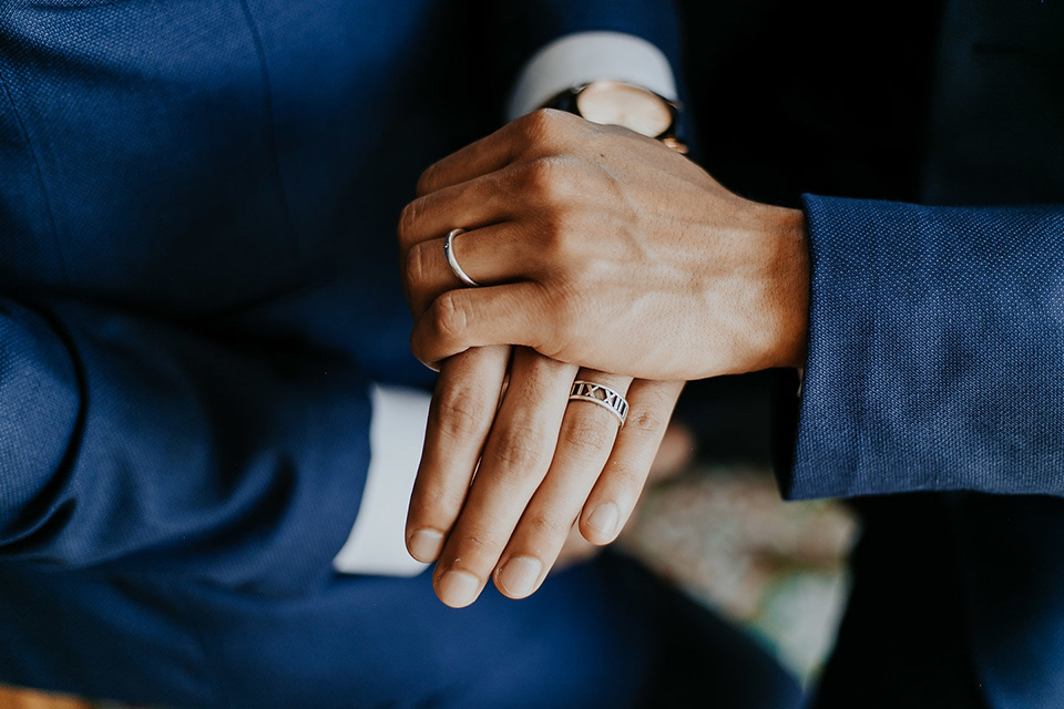 loquita-shoot-hands-grooms-in-cobalt-blue-suits-with-one-with-a-green-tie-and-the-other-with-a-blue-bow