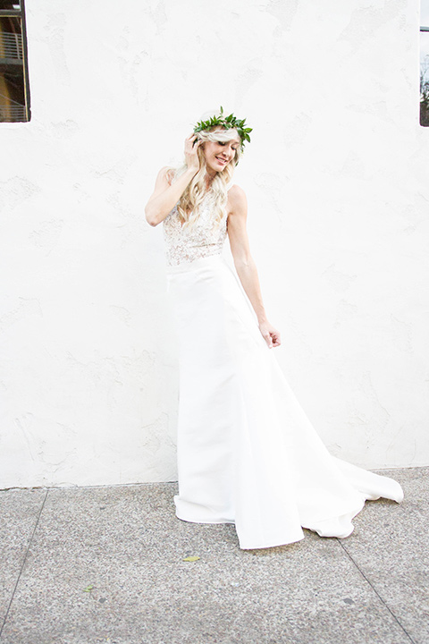 luce-loft-bride-standing-bride-in-a-fit-and-flare-gown-with-straps-groom-in-a-charcoal-suit-with-champagne-bow-tie