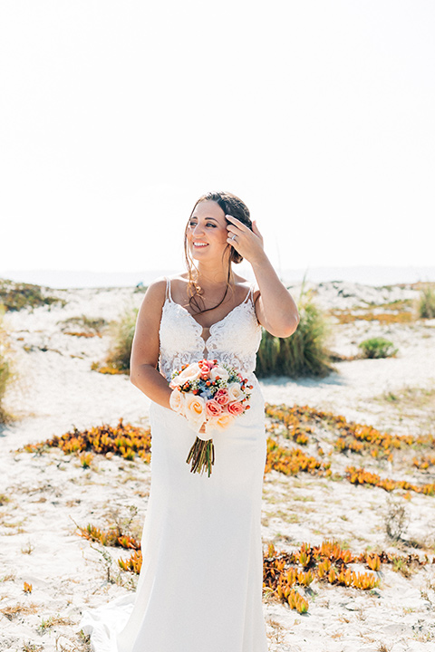 San-Diego-Beach-wedding-bride-in-a-lace-form-fitting-dress-with-straps