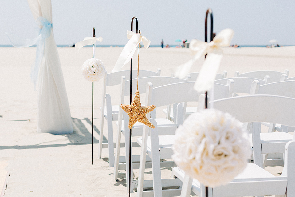 San-Diego-Beach-wedding-ceremony-chairs-in-white-with-nautical-decor