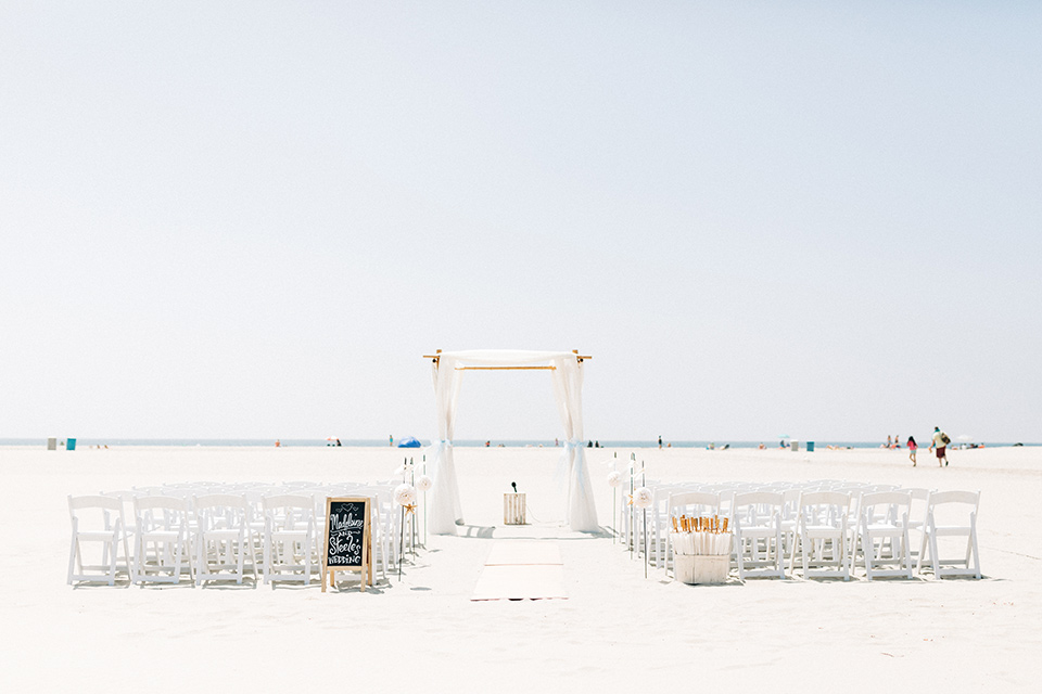 San-Diego-Beach-wedding-ceremony-set-up-with-white-décor-on-the-sand