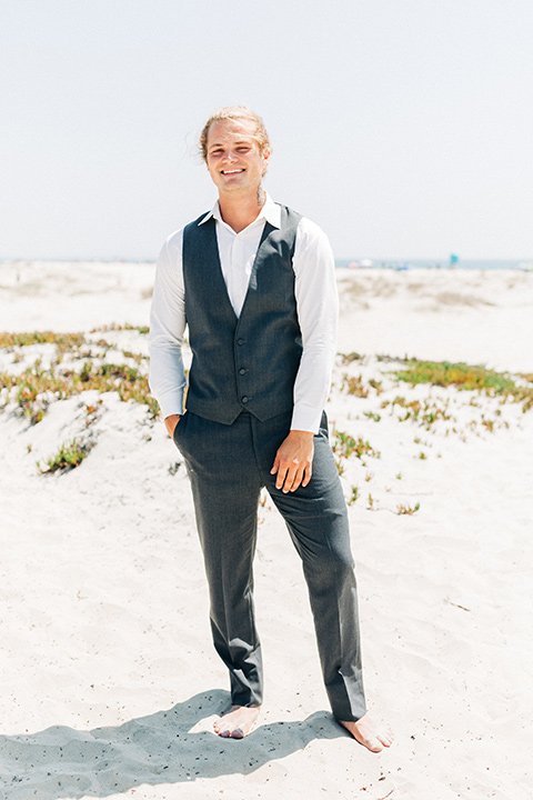 San-Diego-Beach-wedding-groom-in-a-grey-suit-pant-and-vest