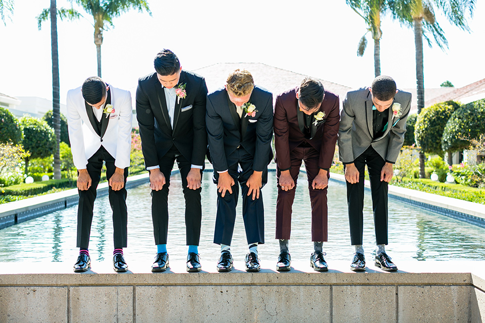 prom-looks-guys-showing-off-their-socks-and-tuxedo-prom-ideas