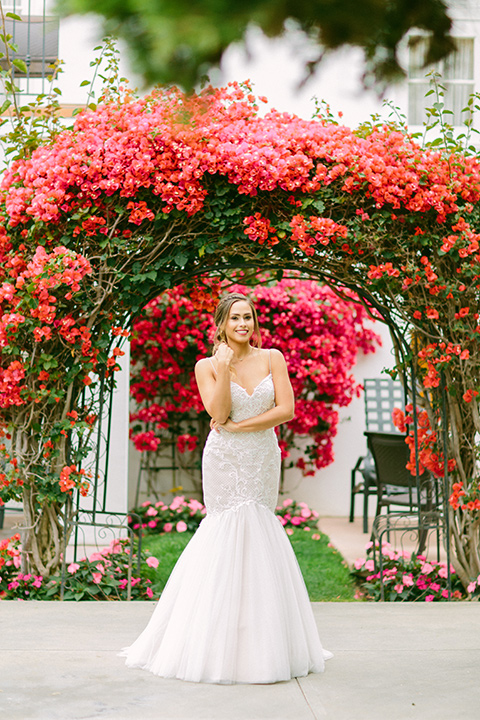 omni-la-costa-bride-alone-bride-wearing-a-lace-fitted-gown-with-mermaid-style-with-thin-straps