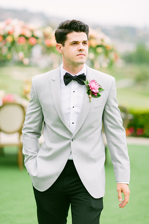 omni-la-costa-groom-standing-alone-groom-with-light-grey-jacket-with-black-pants-black-polka-dot-bowtie