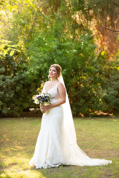 Palm-Springs-wedding-at-the-parker-bride-alone-in-a-flowing-gown-and-a-deep-v-neckline