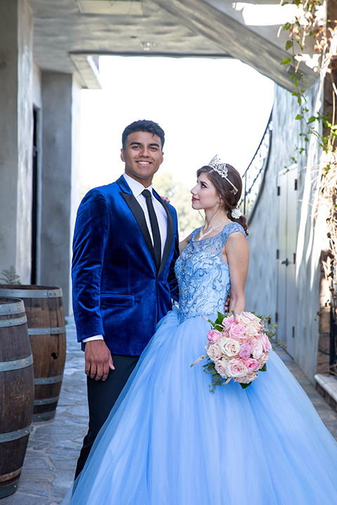 quince-shoot-birthday-girl-in-a-baby-blue-cinderella-dress-chambelan-in-a-royal-blue-vlevet-tuxedo-close-up