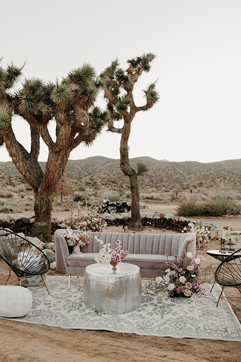 Rim-Rock-Ranch-Shoot-ceremony-space-with-velvet-furniture-and-light-colored-pillows