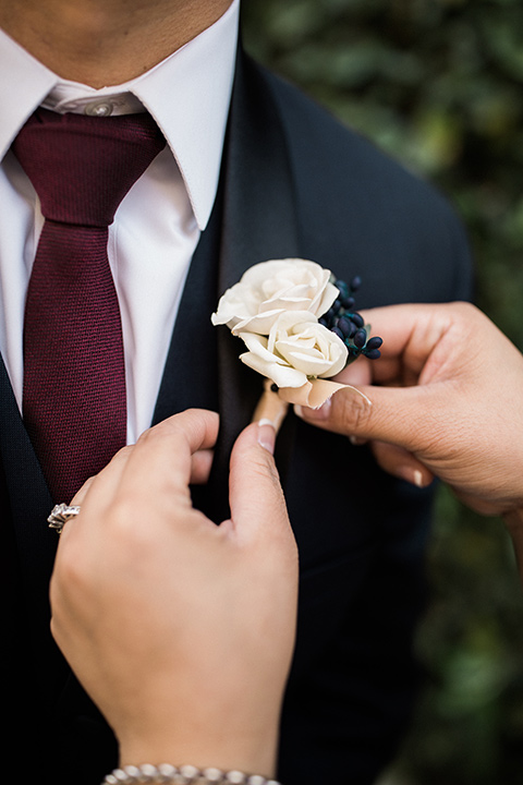 villa-del-sol-wedding-close-up-on-groom-and-his-necy-shawl-lapel-tuxedo