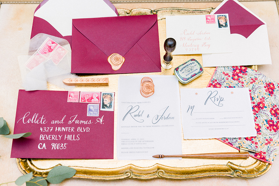  pink and white invitations with gold calligraphy