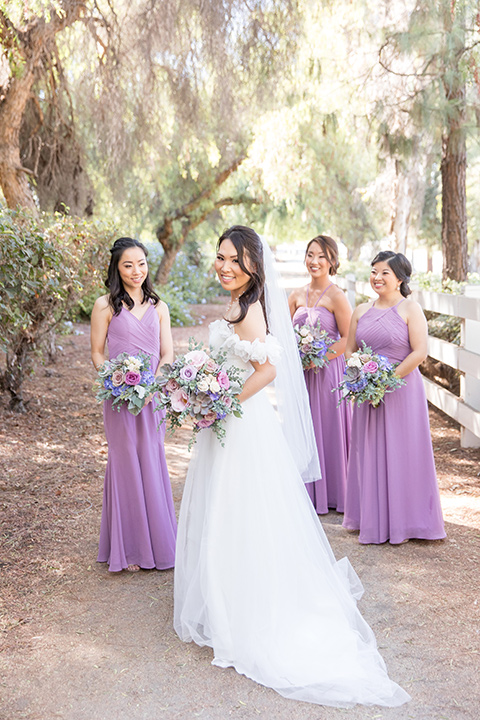 bridesmaids dresses in lilac colors with different necklines