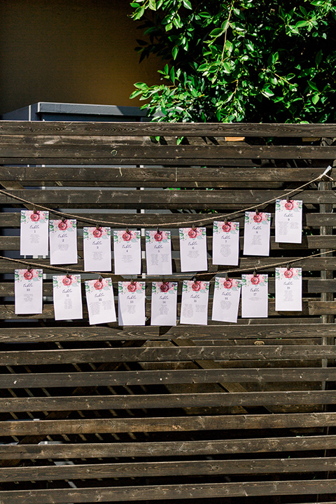  table cards hanging on a wood palette