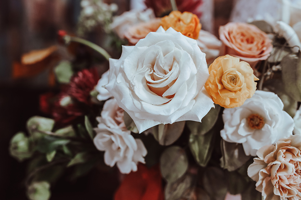 orange flowers with white and green accents 