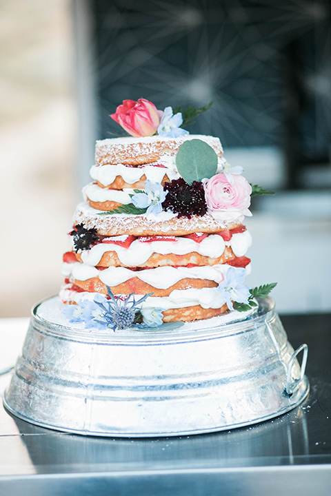  white cake with natural icing and fruit