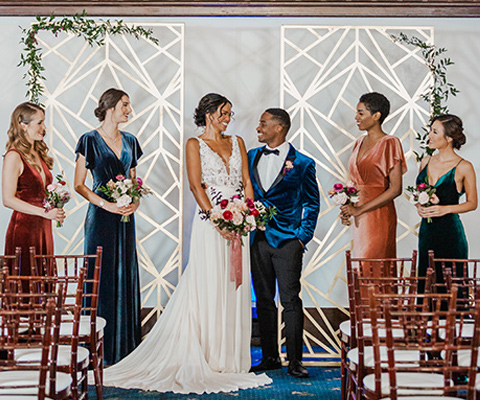  bridesmaids-in-velvet-gowns-and-groom-in-velvet-tuxedo