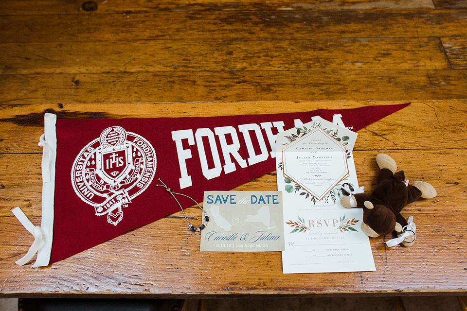  invitations with their college logo on them