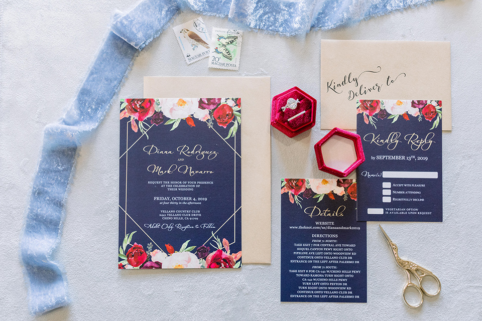  royal blue invitations with pink and red flowers