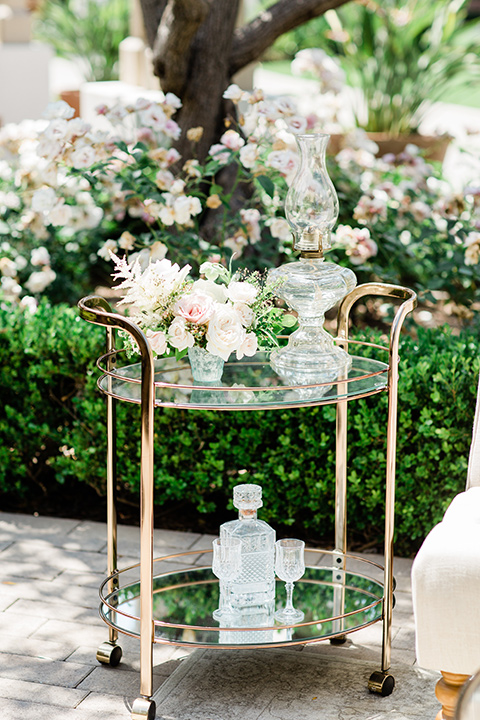  bar cart with drinks on it 