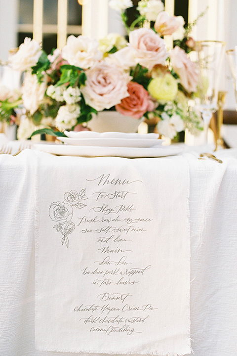  table with linens and florals 