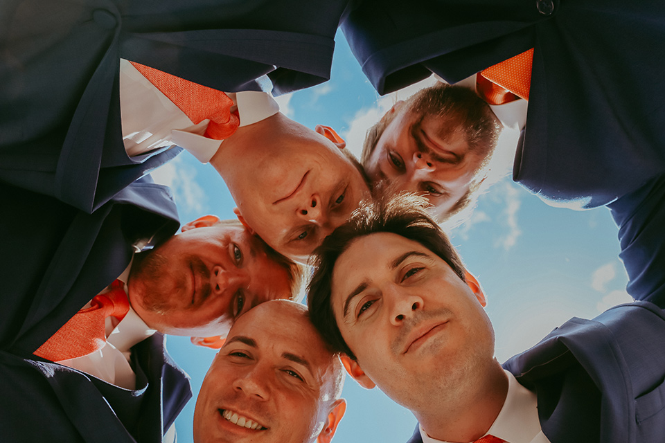  the groom in a cobalt blue suit for purchase and the groomsmen in rental cobalt suits 