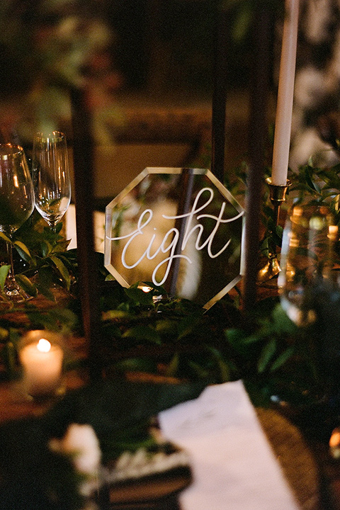  table numbers and décor on reception tables