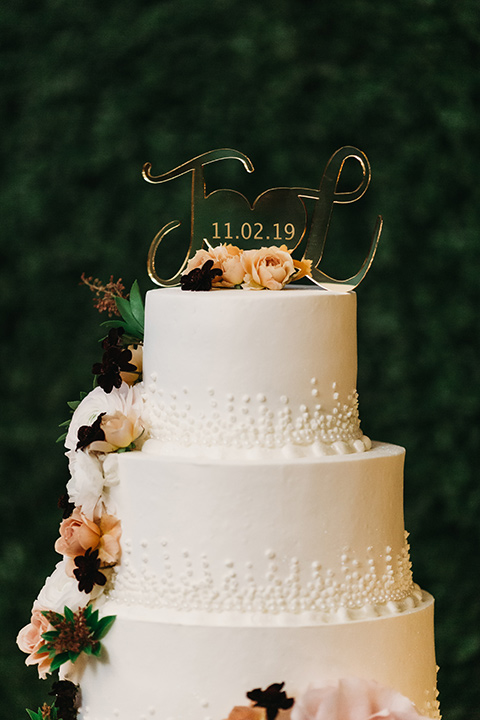  white cake with flowers 