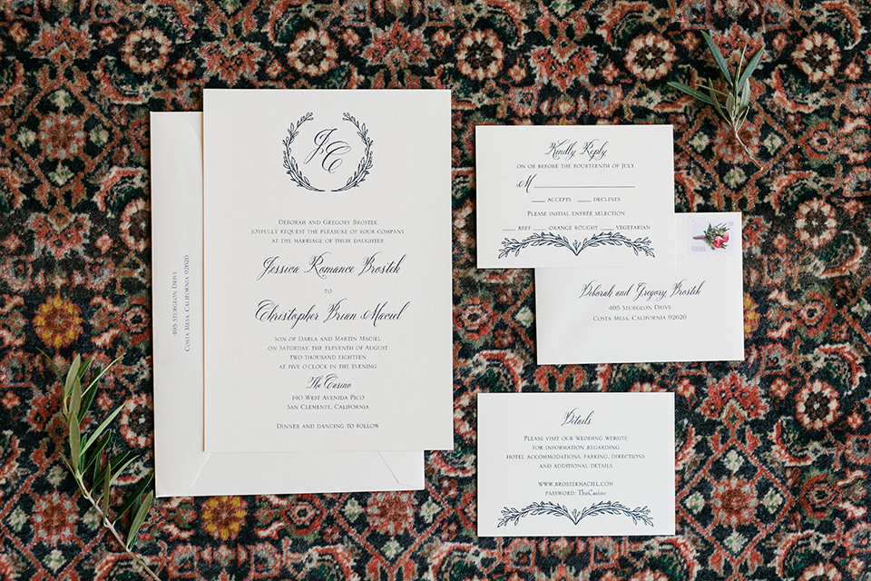  white invitations with calligraphy 