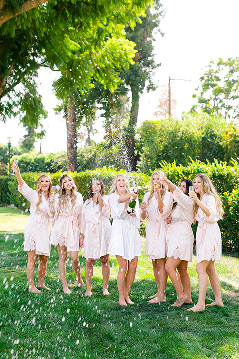  bride and bridesmaids in robes 